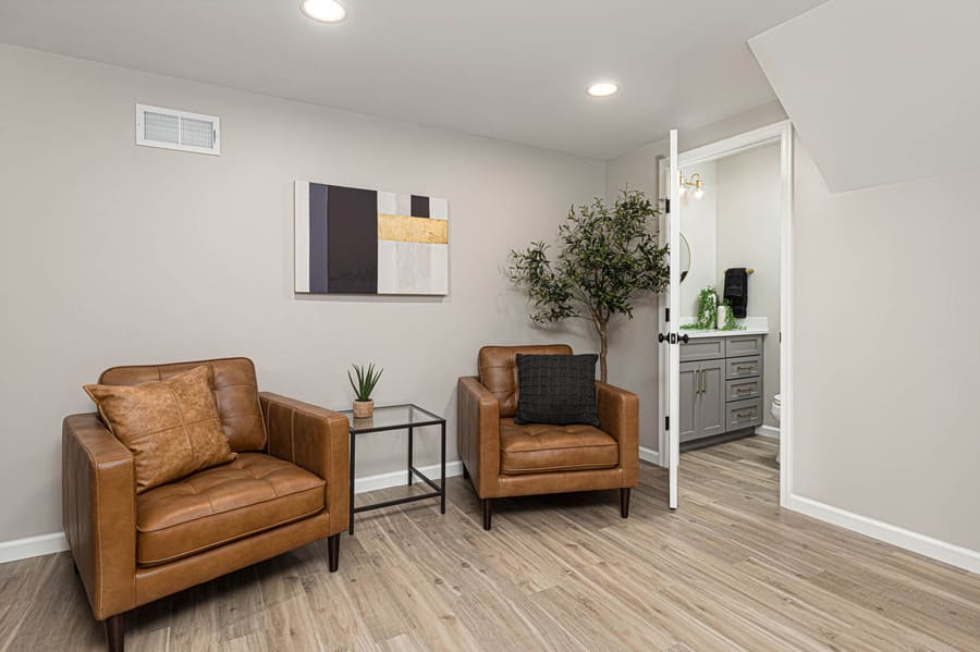 seating area and bathroom in Lancaster Basement Remodel 