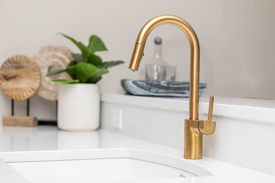 quartz countertop and gold accents in Lancaster Basement Remodel 