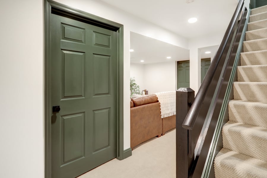 Lancaster Basement remodel with green trim and doors