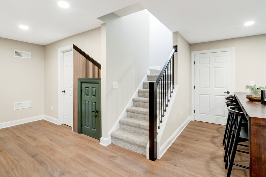Carpeted stairs and LVP flooring in lancaster basement remodel
