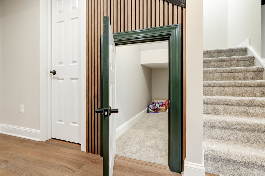 hidden kids play room understairs in lancaster basement remodel