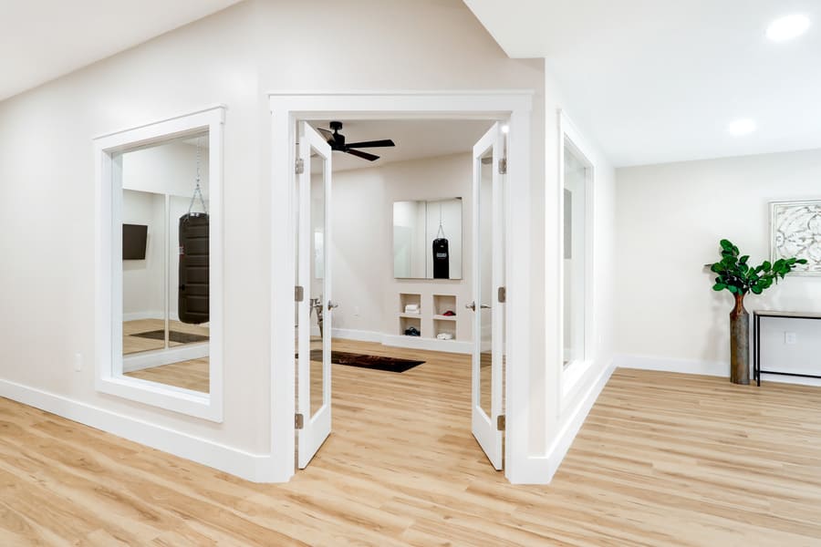 gym behind double doors in Lititz Basement Remodel