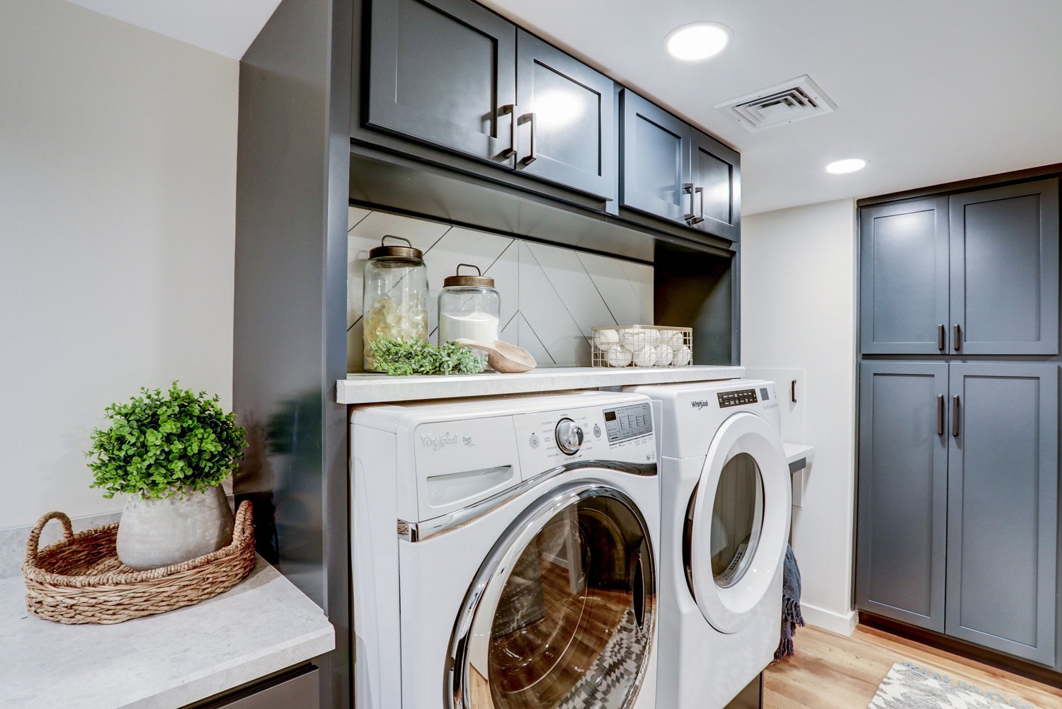 Lancaster Basement Remodel with custom storage around washer and dryer