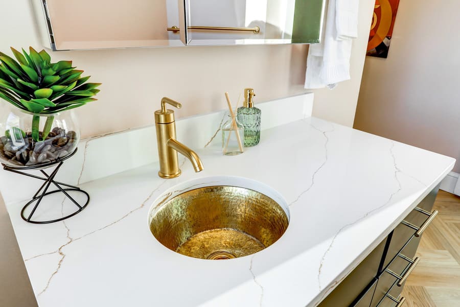 Lancaster Primary Bathroom Remodel with gold sink