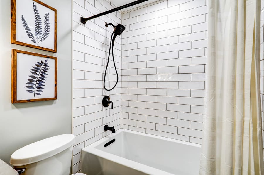 Lancaster Bathroom Remodel with tile shower and matte black fixtures