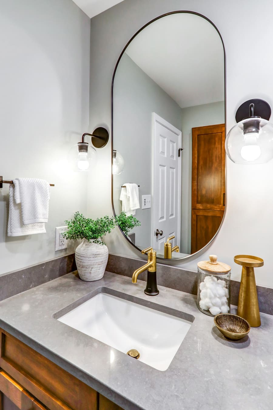 Lancaster Bathroom Remodel with oval mirror
