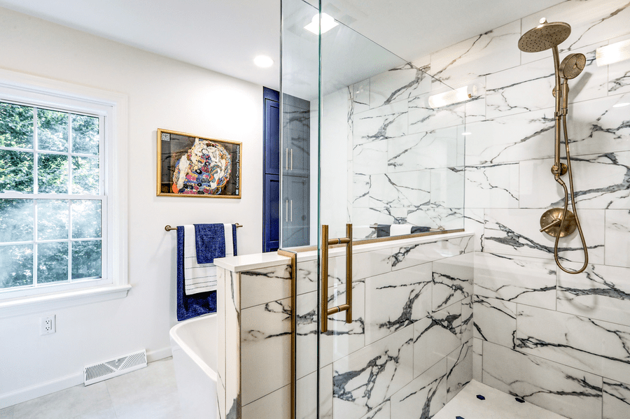 Beautiful tile shower with blue veining in Lancaster Primary Bathroom Remodel