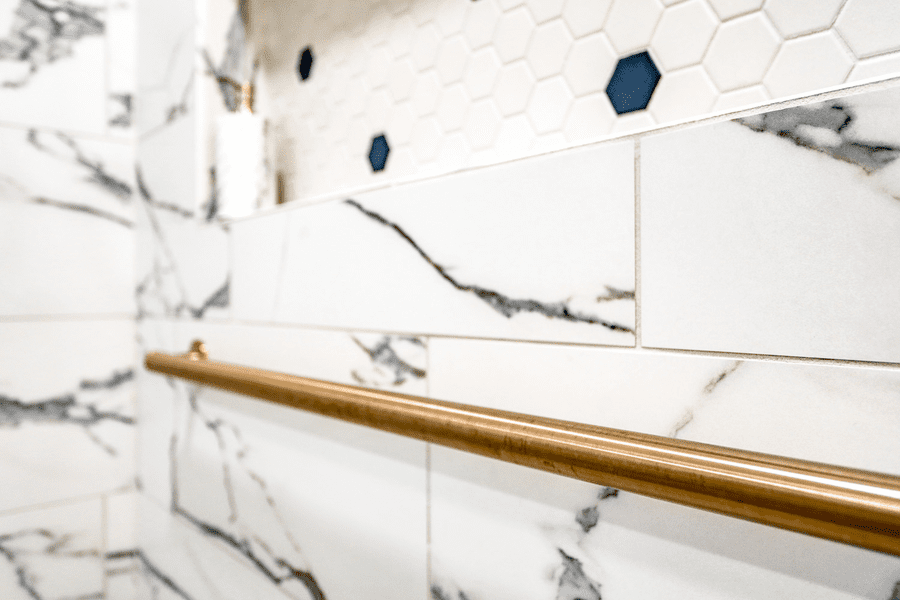 Lancaster Primary Bathroom Remodel with gold grab bar