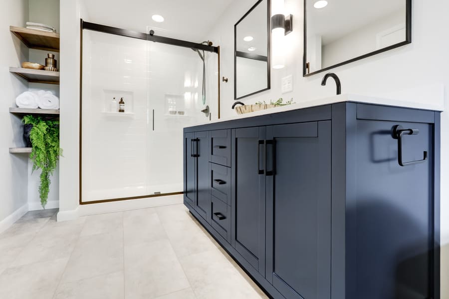 blue vanity with towel hook in Lancaster Primary Bathroom Remodel