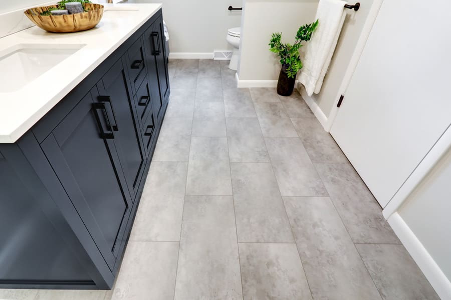 gray LVT flooring in Lancaster Primary Bathroom Remodel