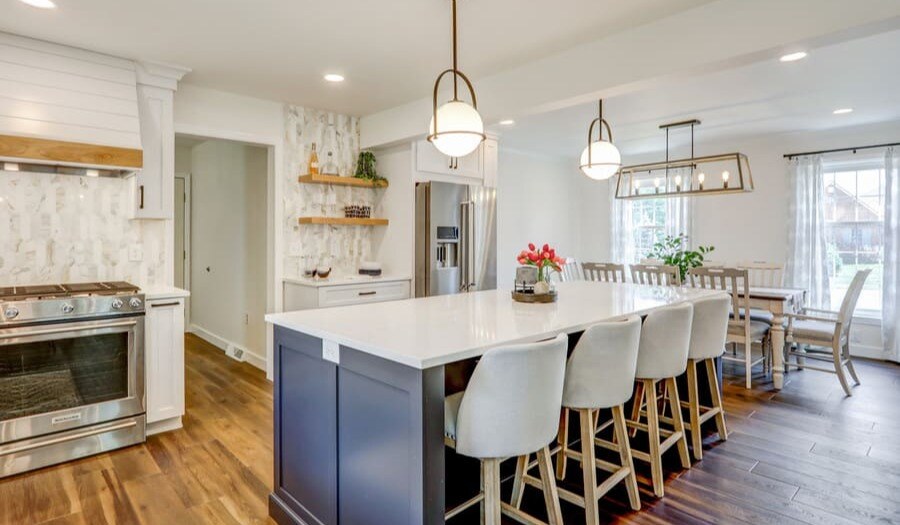 kitchen remodeling with trending blue cabinets and gold accents