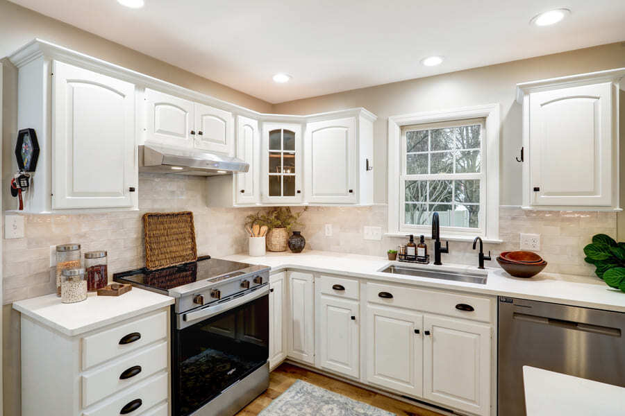Conestoga Valley Kitchen Remodel with white cabinets and matte black hardware