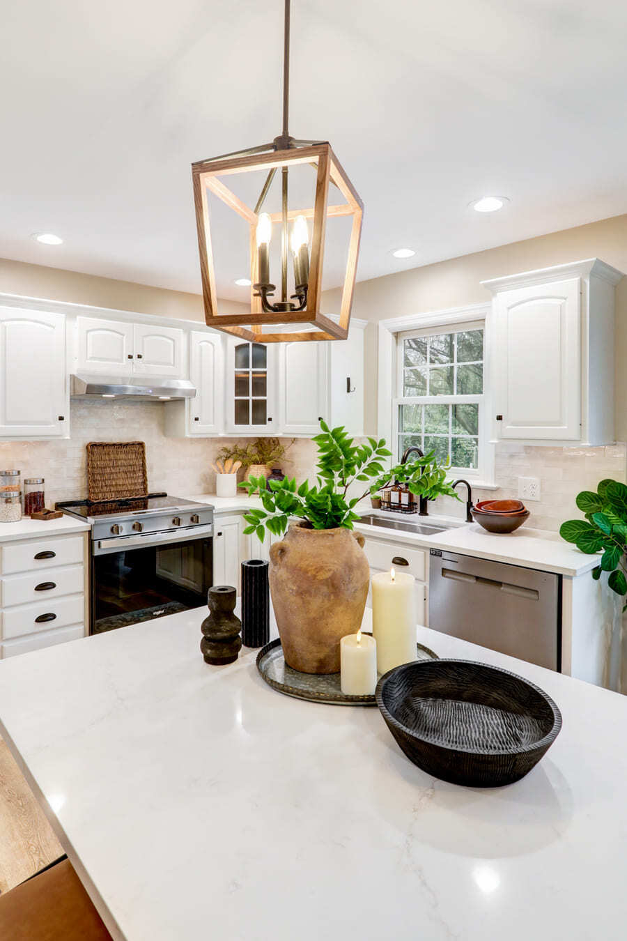 wooden pendant lighting over island in Conestoga Valley Kitchen Remodel