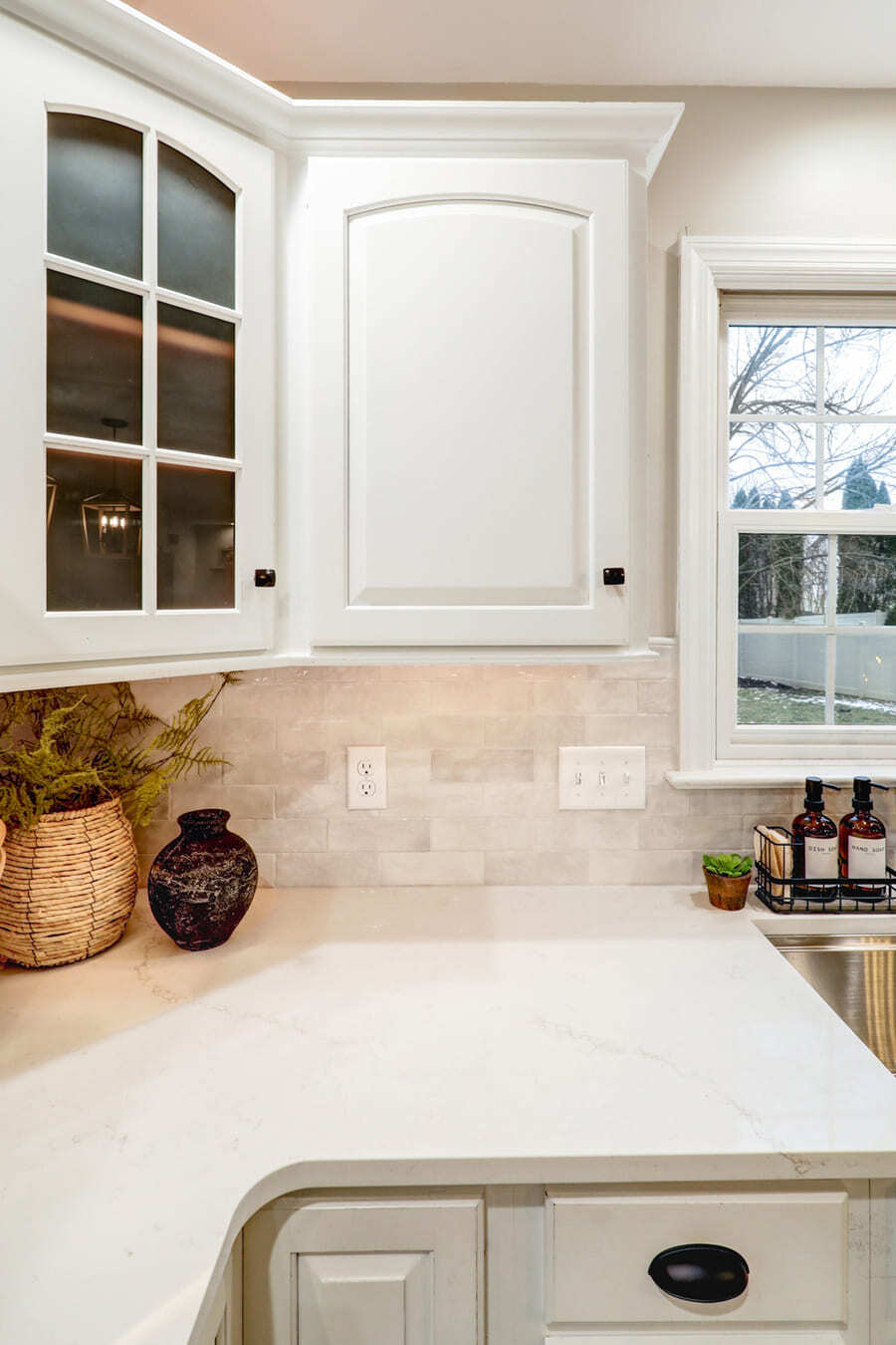 Glossy tile backsplash and glass door front in Conestoga Valley Kitchen Remodel