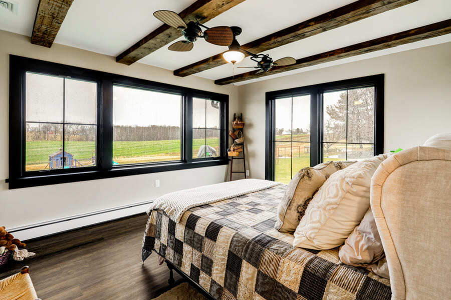 Lancaster Bedroom Remodel with large matte black windows