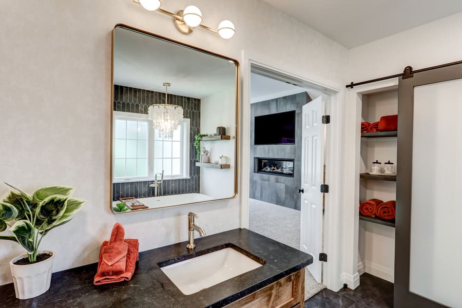 Lancaster primary bathroom addition with gold accents
