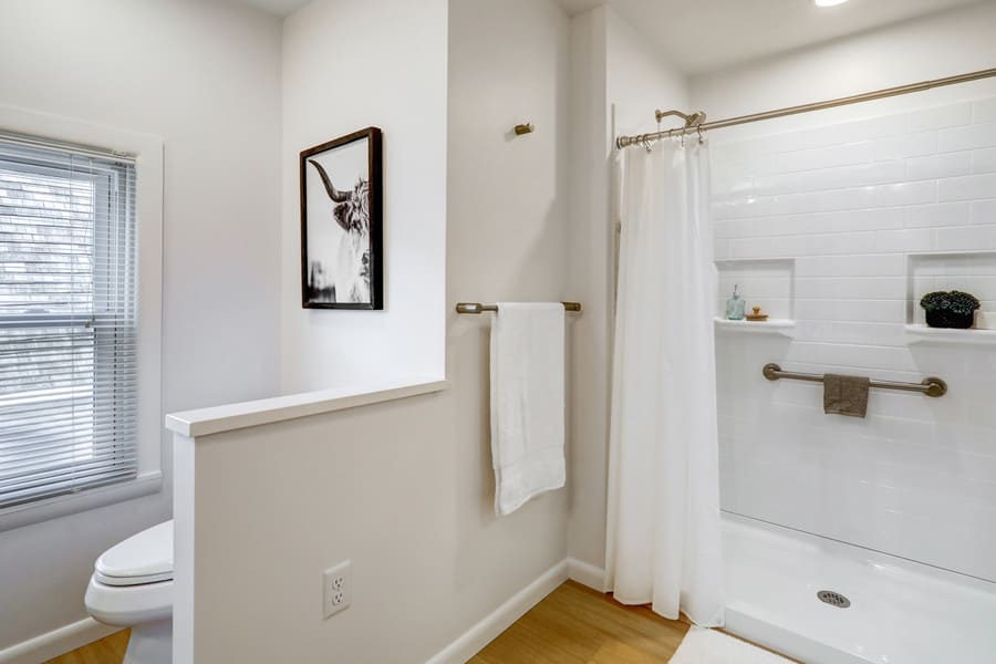 Historic Lancaster Home Bathroom Addition with half wall for privacy
