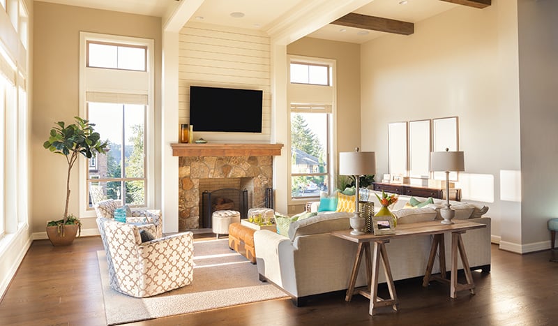 Living room with fireplace and large windows