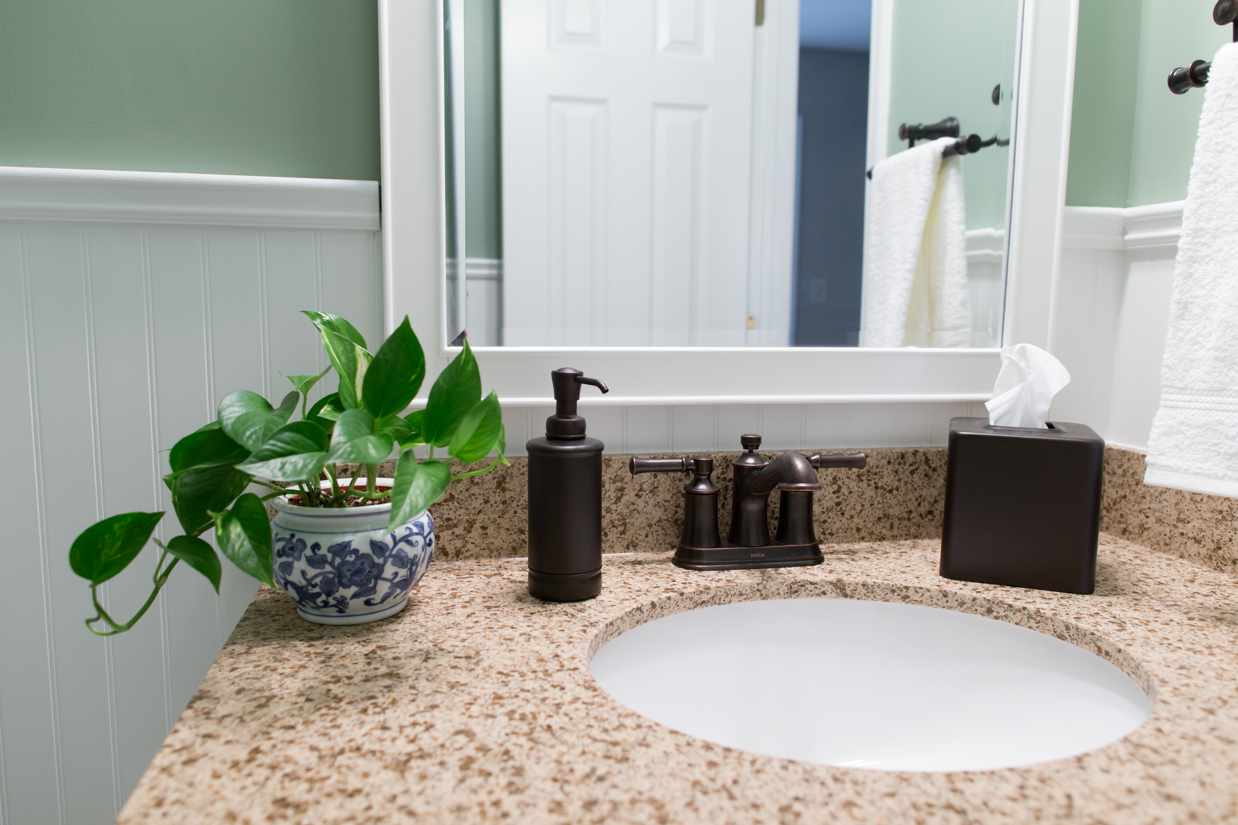 Ephrata Powder Room Remodel with bronze hardware