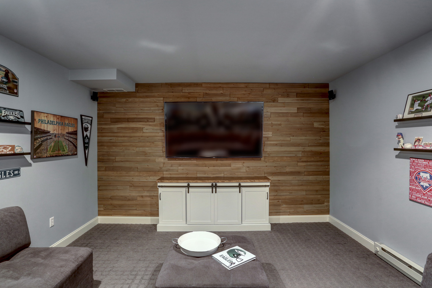 Lititz Basement Remodel with wooden accent wall