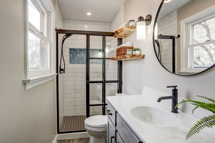 Round mirror and live edge shelves in Neffsville bathroom remodel