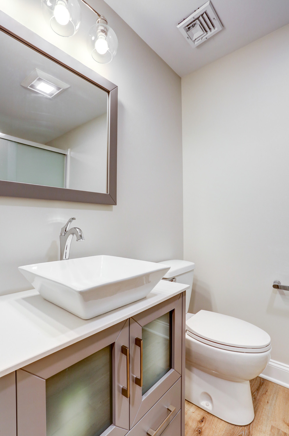 Lampeter Basement Bathroom with wood vanity and single sink