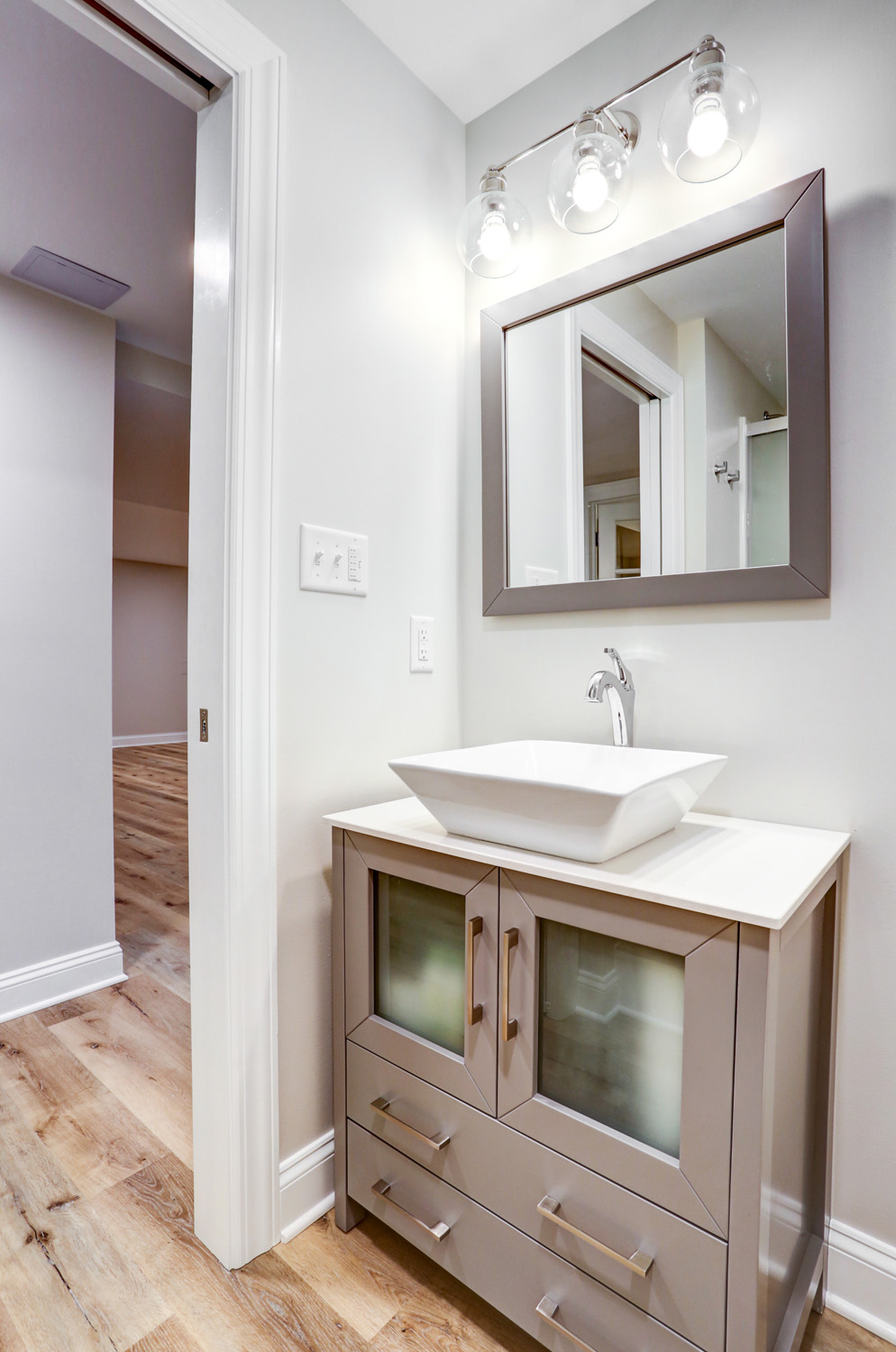 Basement bathroom addition in Lampeter with vanity and vessel sink