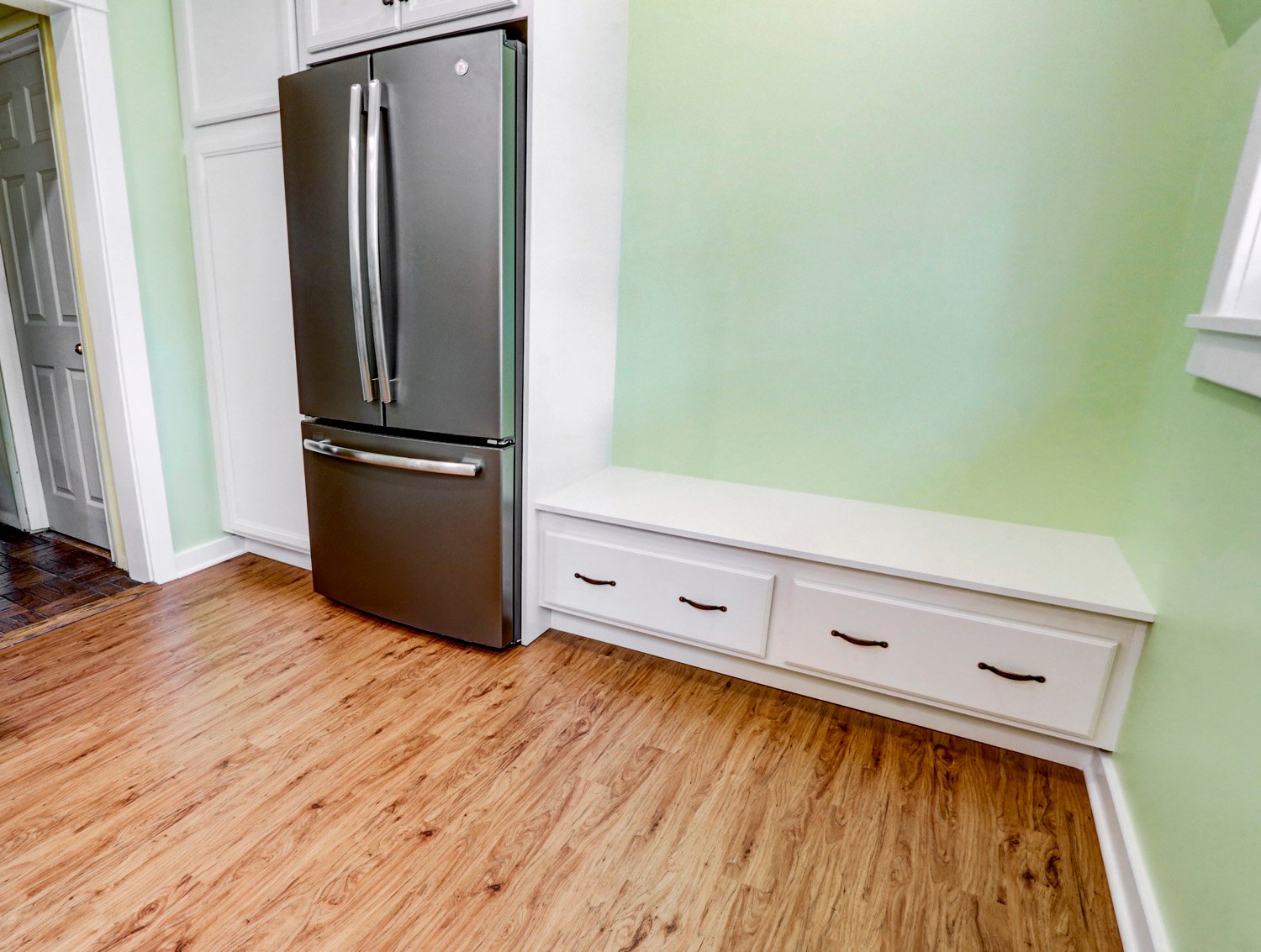 Bench Seating and Green walls in Lancaster City Kitchen Remodel