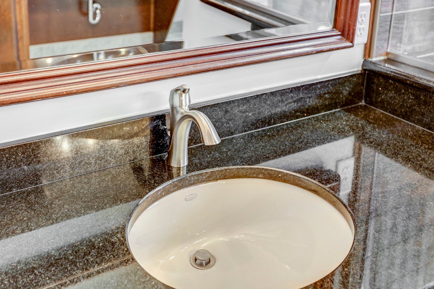 Lancaster bathroom remodel with granite countertop and single sink