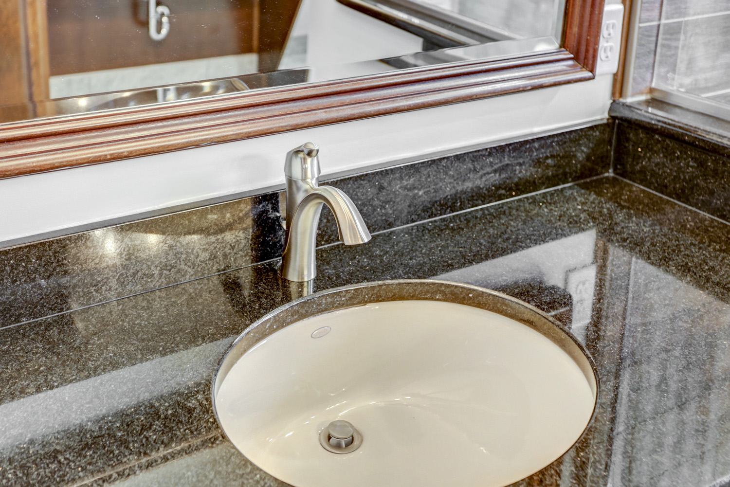 Lancaster bathroom remodel with granite countertop and single sink