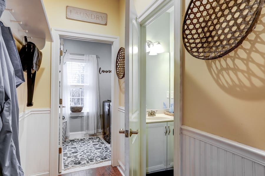 Hallway into Laundry room and powder room before remodel