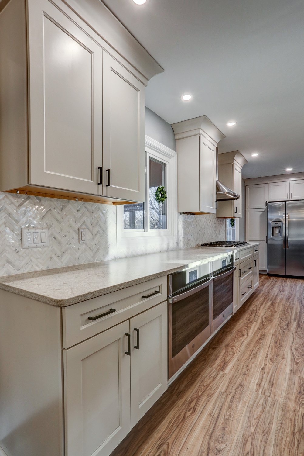 Manheim Township Kitchen Remodel with white cabinets and two wall ovens