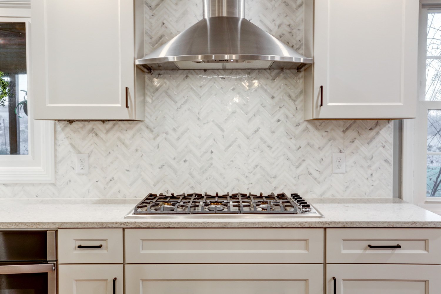 Gas stove and gray backsplash in Manheim Township Kitchen Remodel