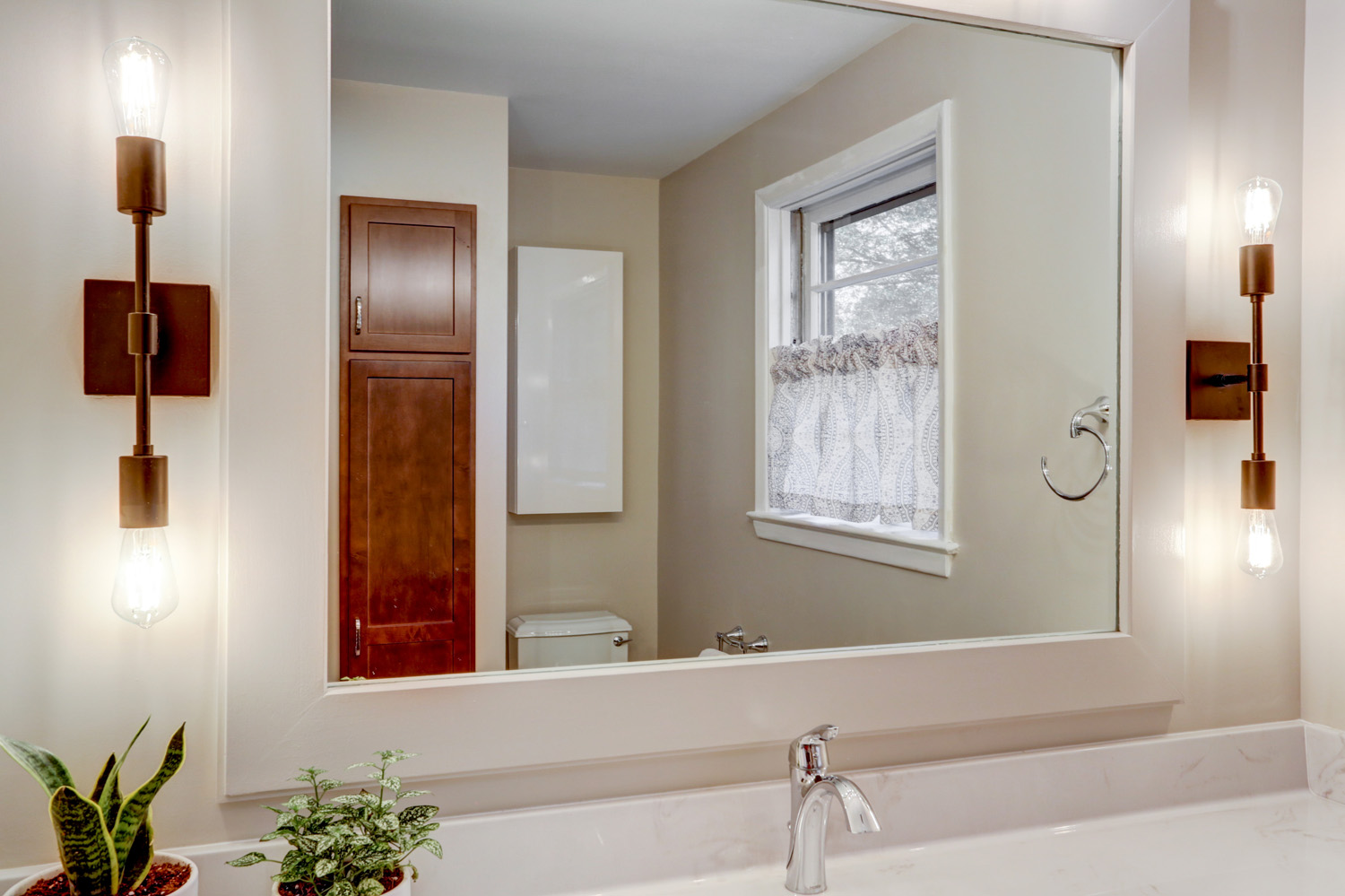 Mirror and Matte Black Light Fixtures in Manheim Township Bathroom remodel