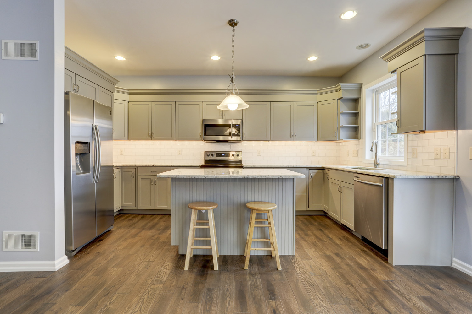 Marietta Kitchen Remodel with island, gray cabinets, and recessed lights