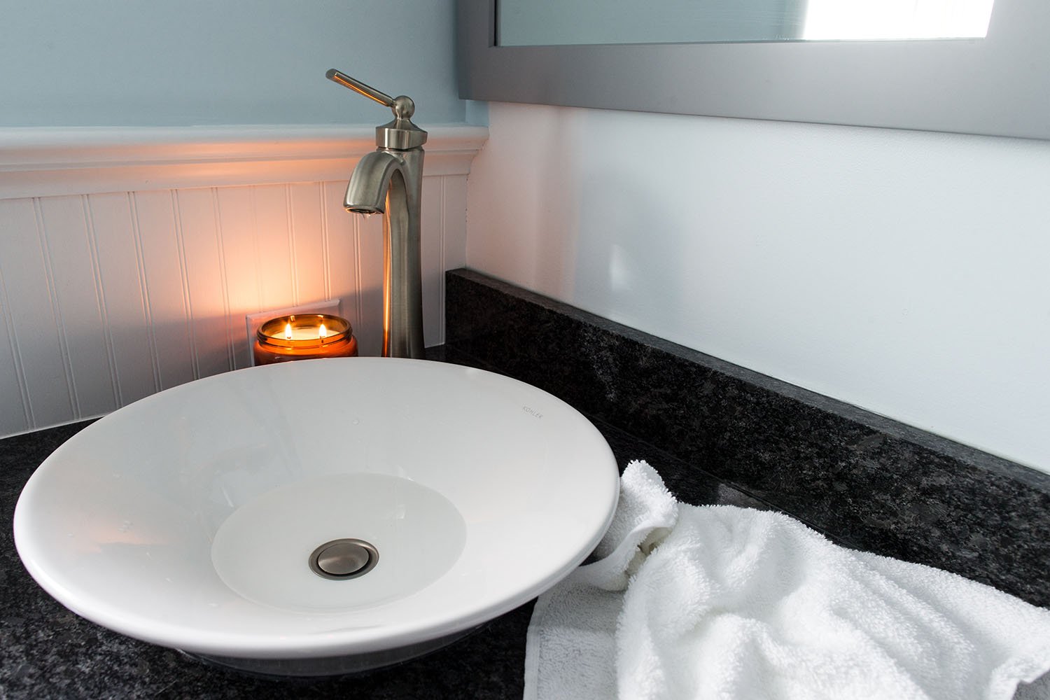 Circular vessel sink with brushed nickel faucet in Millersville Master Bathroom Remodel