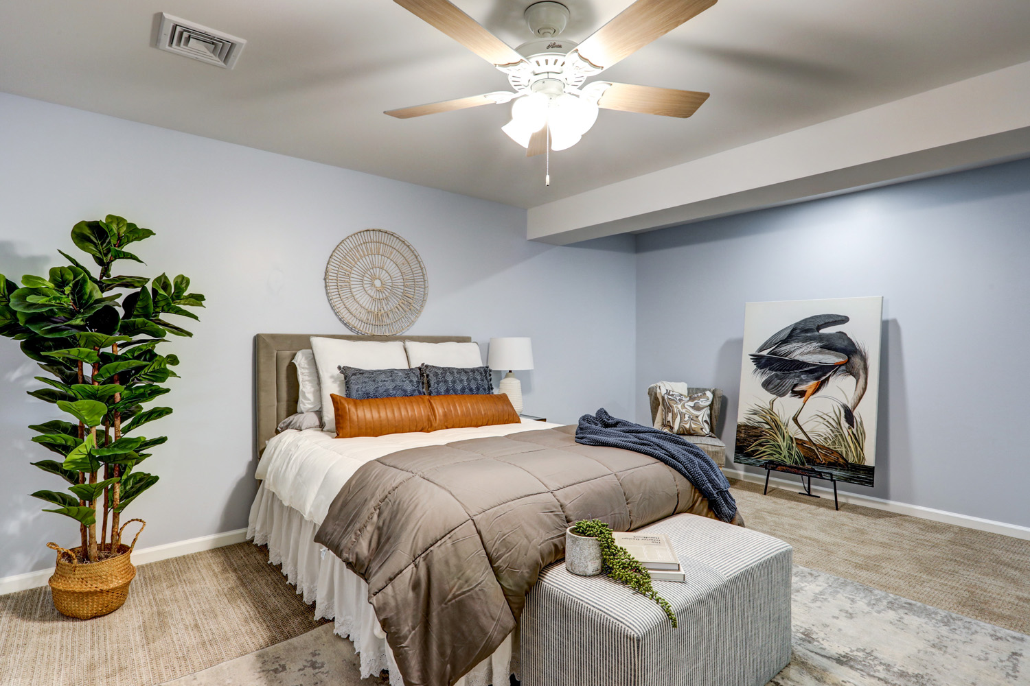 Bedroom with blue walls in Manheim Basement Remodel