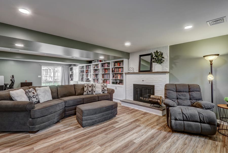 Fireplace and bookshelves in Lititz basement remodel