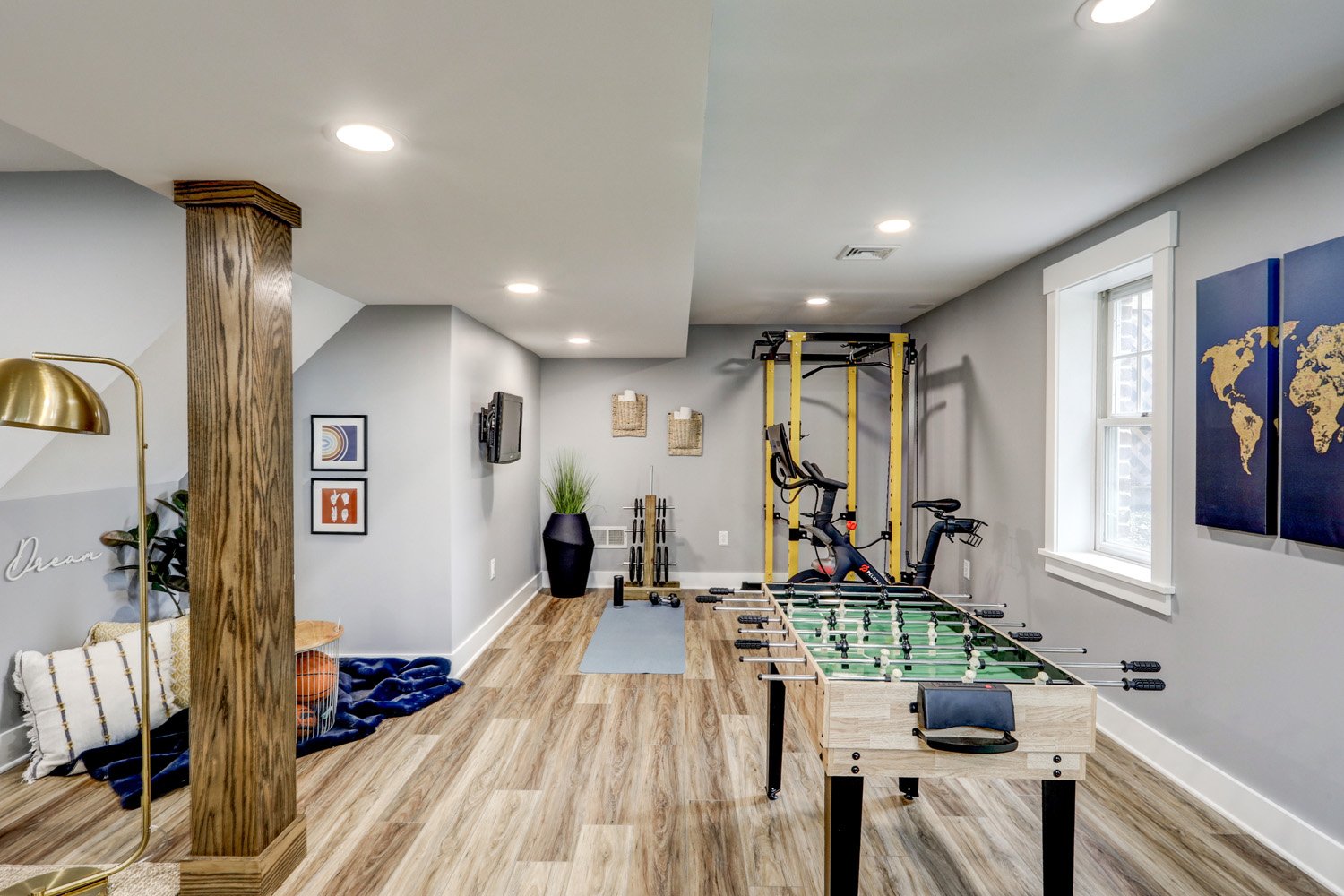 Lititz Basement Remodel with workout area and game area