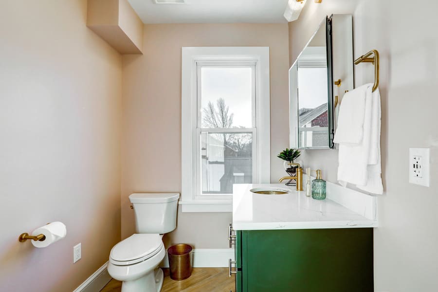 Green vanity in Lancaster Primary Bathroom Remodel