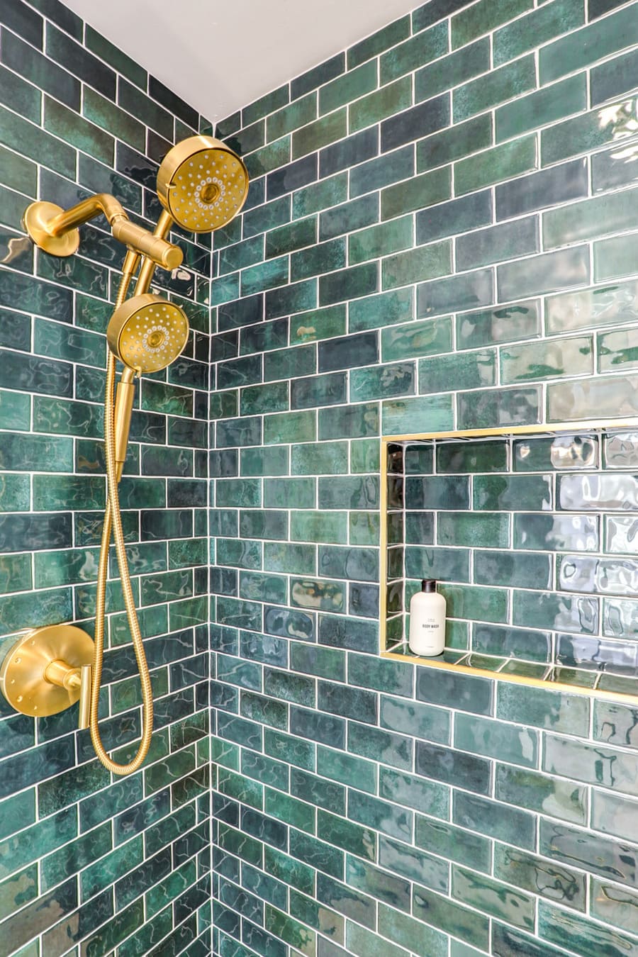 Lancaster Primary Bathroom Remodel with green tile and gold accents