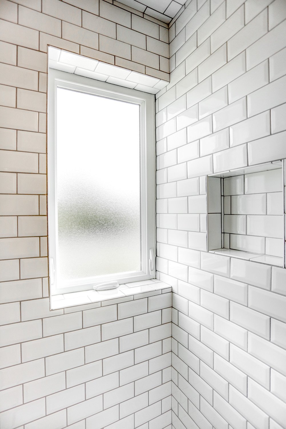 Tile shower with window in Lancaster City Bathroom Remodel