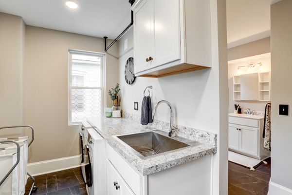 Laundry room and bathroom in Lancaster home remodel