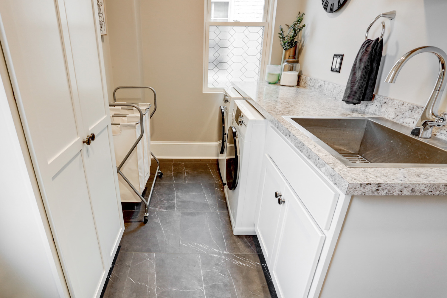 Lancaster Laundry Remodel with white cabinets