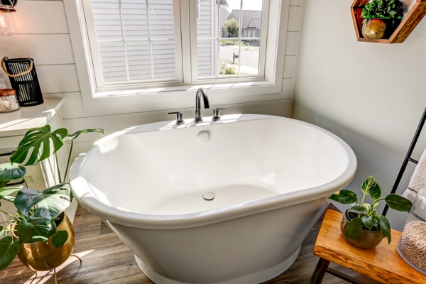 freestanding tub by a window in Lancaster bathroom remodel