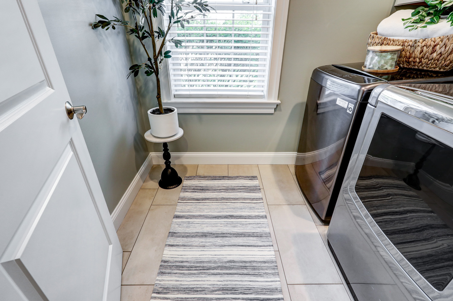 Beige tile floor in Lititz Laundry Room Remodel