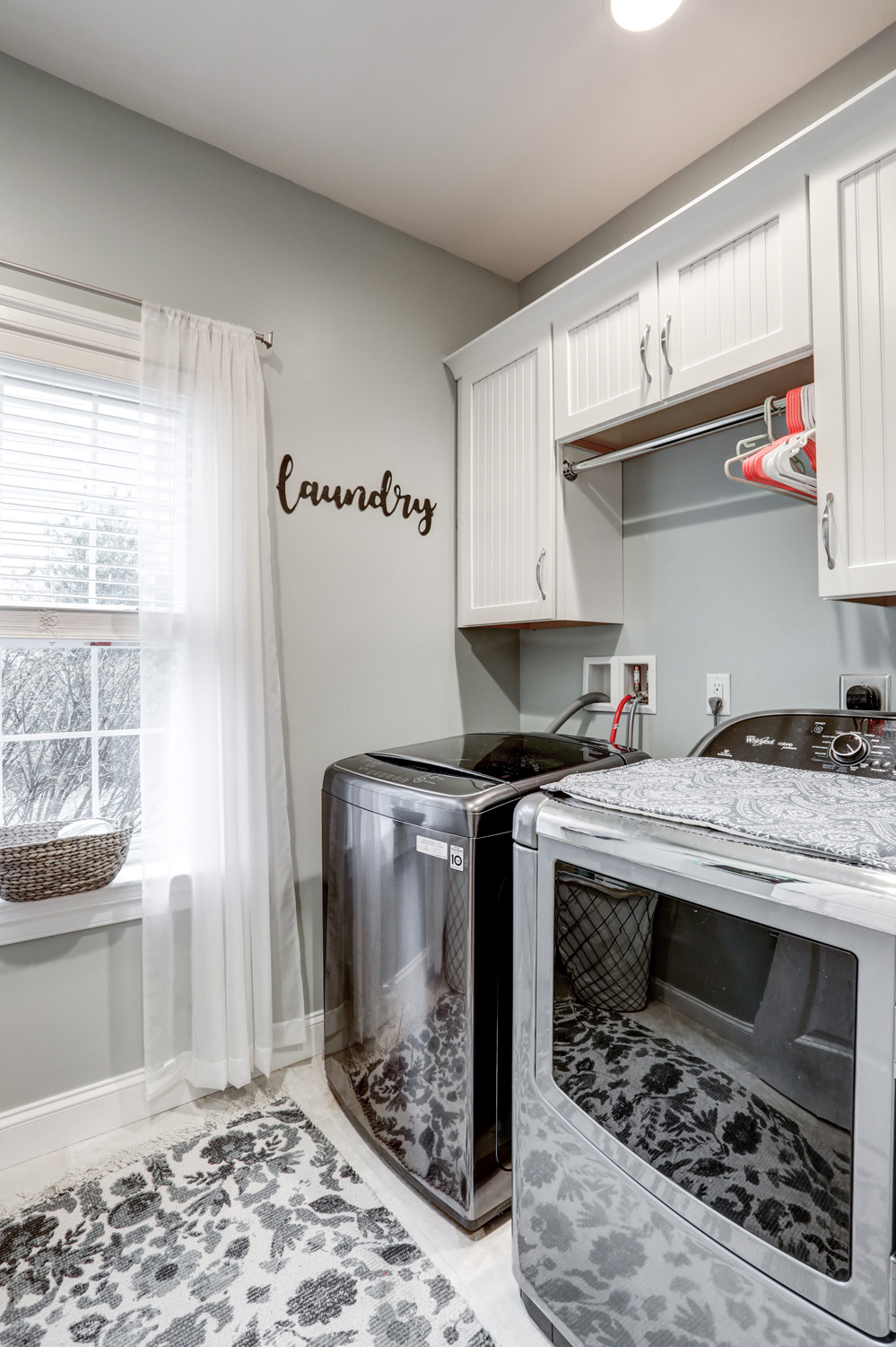 Lititz Laundry Room Remodel with white cabinets