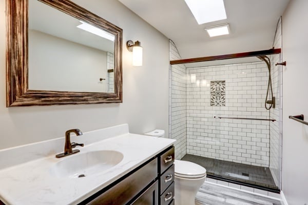 Bathroom remodel in Lancaster with custom tile shower and glass shower door