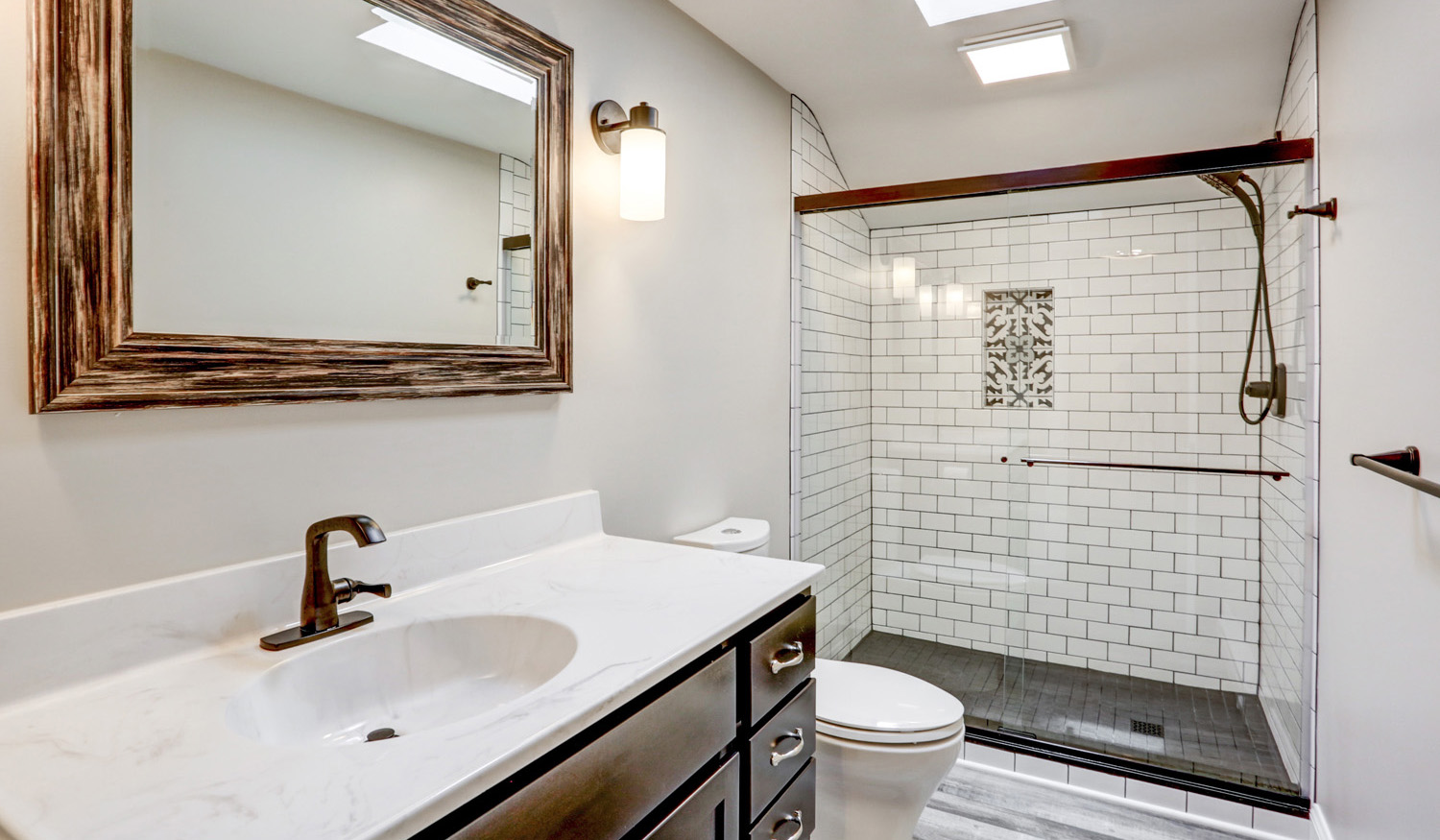 Lancaster Bathroom Remodel with Tile shower and dark accents