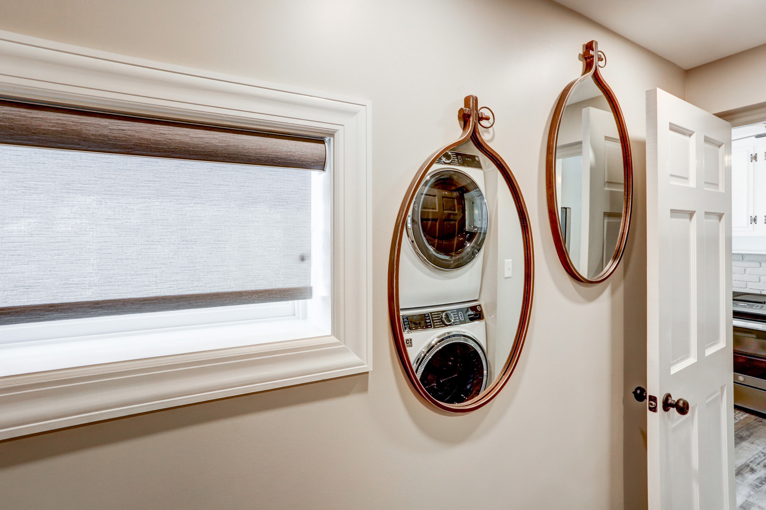 Mirrors and window in Lancaster Laundry Room Remodel